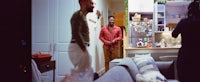 a man is standing in a living room