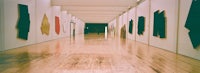 a wooden floor in an art gallery