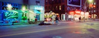 a blurry image of a city street at night