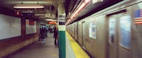 a subway train in a subway station