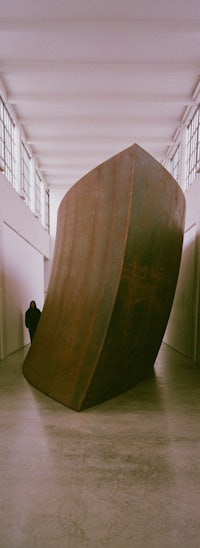 a large metal sculpture in a large room